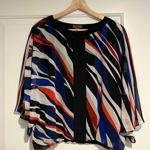 Vince Camuto size S flowy top.  Airy and light weight.  Excellent condition.